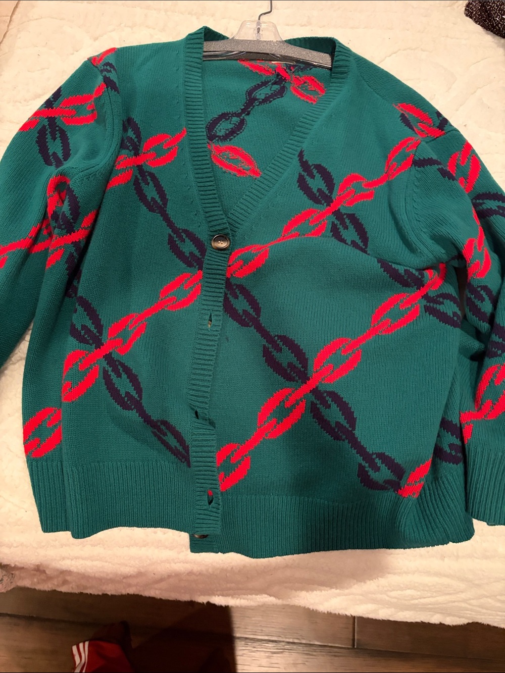 Teal V‑Neck Cardigan Sweater with Red & Navy Chain Motif